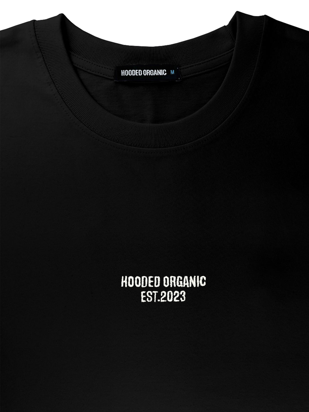 Close-up af stoffet på sort blank T-shirt – 100% økologisk og blød tekstur